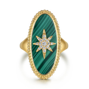 Gabriel & Co. LR52515Y45MA 14 karat yellow gold Bujukan ring, top view of the long oval green face, its diamond starburst and beaded rim