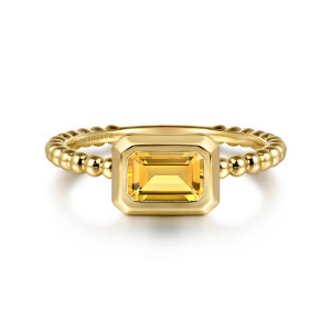 Gabriel & Co. LR52684Y4JCT 14 karat yellow gold Bujukan ring, front view of the sideways rectangular stone in a smooth bezel between beaded arms