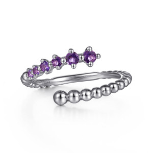 Gabriel & Co. LR52856SVJAM sterling silver Bujukan ring, front view of a graduated row of violet stones beside a run of polished beads