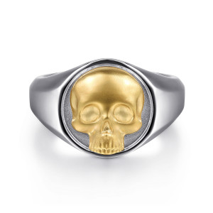 Gabriel & Co. MR20184MZJJJ sterling silver and 14 karat yellow gold Vita Ex Morte men's signet ring, front view of the raised skull with hollow eyes on a satin disc inside a polished rim