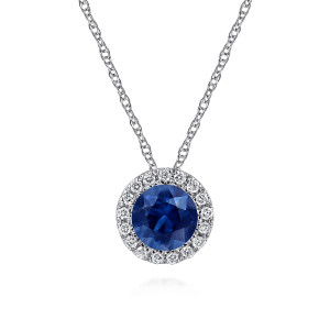Gabriel & Co. NK2824W45SA 14 karat white gold Color necklace, front view of a round blue faceted stone inside a ring of round diamonds