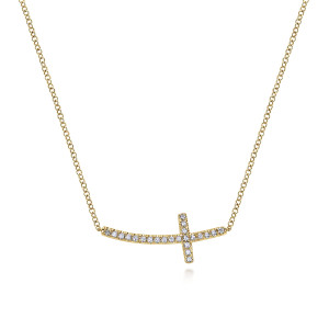 Gabriel & Co. NK4346Y45JJ 14 karat yellow gold Lusso necklace, front view of the curved sideways cross with its single line of round diamonds