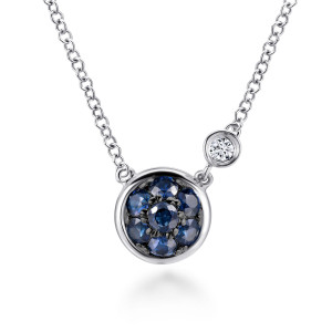 Gabriel & Co. NK5240SV5SB sterling silver Color necklace, front view of the blue stone cluster in its rim and the offset bezel diamond