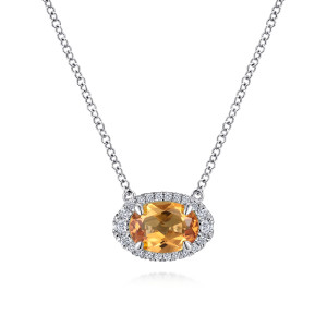 Gabriel & Co. NK5312W45CT 14 karat white gold Color necklace, front view of the sideways orange oval, four prongs and the diamond halo joined to the chain ends