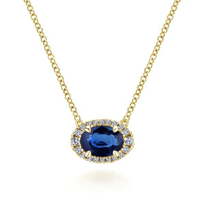 Gabriel & Co. NK5385Y45SA 14 karat yellow gold Color necklace, front view of the deep blue oval stone in prongs, its diamond halo joined to the chain