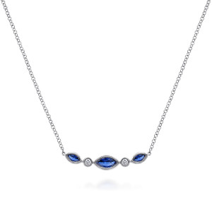 Gabriel & Co. NK5420W45SA 14 karat white gold Color necklace, front view of the blue marquise stones alternating with tiny round stones