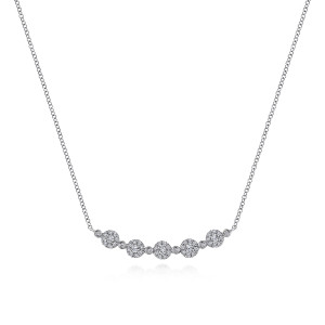 Gabriel & Co. NK5802W45JJ 14 karat white gold Kaslique necklace, front view of round halo clusters spaced by tiny bezel set stones
