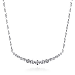 Gabriel & Co. NK6215W45JJ 14 karat white gold Lusso necklace, front view of the curved bar of graduated round stones on a fine chain