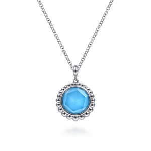 Gabriel & Co. NK6541SVJXT sterling silver Bujukan necklace, front view of the round blue stone, its flat planes, bezel and scalloped bead rim