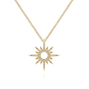 Gabriel & Co. NK6766Y45JJ 14 karat yellow gold Lusso necklace, front view of a starburst with an open round center and tapering rays set with small diamonds