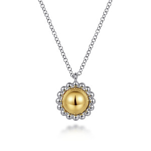 Gabriel & Co. NK6898MZJJJ sterling silver and 14 karat yellow gold Bujukan necklace, front view of the polished dome and the metal bead border around it