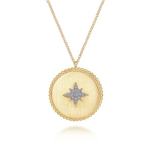 Gabriel & Co. NK6941Y45JJ 14 karat yellow gold Bujukan necklace, front view of a brushed round medallion with a beaded rim and a pave starburst