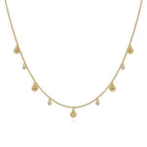 Gabriel & Co. NK6943Y45JJ 14 karat yellow gold Bujukan necklace, front view of beaded domes alternating with milgrain bezel diamonds on a cable chain