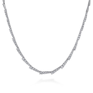 Gabriel & Co. NK6982W84JJ 18 karat white gold Lusso necklace, front view of the prong set diamond line stepping up and down in size