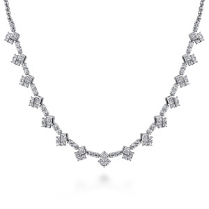Gabriel & Co. NK6989W84JJ 18 karat white gold Kaslique necklace, front view of tilted square stones in bezels beside round stone clusters