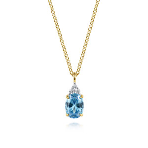 Gabriel & Co. NK7046Y45BT 14 karat yellow gold Color necklace, front view of an oval blue stone in prongs under a cluster of round diamonds