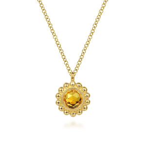 Gabriel & Co. NK7057Y4JCT 14 karat yellow gold Bujukan necklace, front view of the honey toned stone inside its ring of polished metal beads