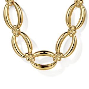 Gabriel & Co. NK7192Y4JJJ 14 karat yellow gold Bujukan necklace, close detail of two bowed oval links joined by a cluster of polished metal beads