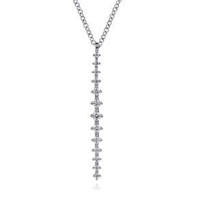 Gabriel & Co. NK7199W45JJ 14 karat white gold Lusso necklace, front view of the vertical bar of graduated round diamonds, each in four prongs, under a small loop