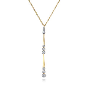 Gabriel & Co. NK7209Y45JJ 14 karat yellow gold Contemporary necklace, front view of the straight drop, its graduated diamond groups and the tapered stems between