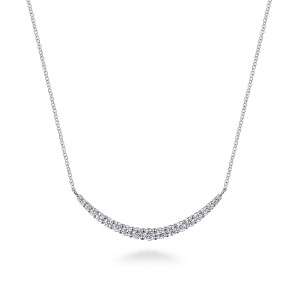 Gabriel & Co. NK7396W45JJ 14 karat white gold Lusso necklace, front view of a curved bar of graduated round stones joined to both sides of the chain