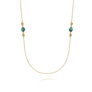 Gabriel & Co. NK7545-32Y4JMA 14 karat yellow gold Bujukan necklace, close detail of two green beads each flanked by polished metal beads on a fine chain