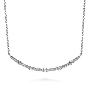 Gabriel & Co. NK7592W45JJ 14 karat white gold Lusso necklace, front view of the curved bar with larger prong set stones among pave stones