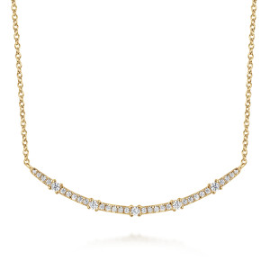 Gabriel & Co. NK7592Y45JJ 14 karat yellow gold Lusso necklace, front view of the curved bar with prong set diamonds between pave runs