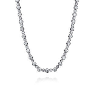 Gabriel & Co. NK7594W45JJ 14 karat white gold Lusso necklace, front view of the alternating bigger and smaller round diamonds meeting at the center