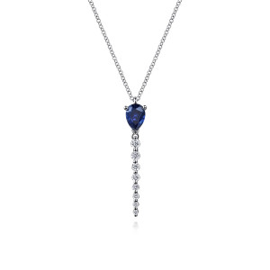 Gabriel & Co. NK7738W45SA 14 karat white gold Color necklace, front view of the blue pear shaped stone above the straight line of round stones