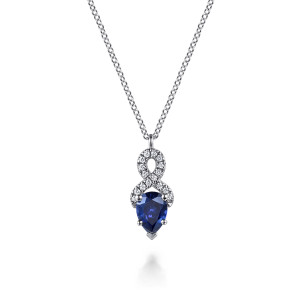 Gabriel & Co. NK7753W45SA 14 karat white gold Color necklace, front view of the blue pear stone, its prongs and the pave figure eight loop above