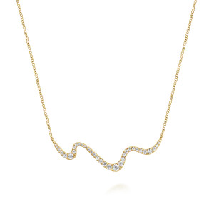Gabriel & Co. NK7765Y45JJ 14 karat yellow gold Lusso necklace, front view of the rolling wavy bar with its line of graduated pave stones