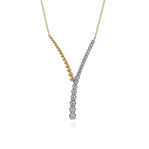 Gabriel & Co. NK7800M45JJ 14 karat white and yellow gold Bujukan necklace, front view of the beaded arm and the bezel set diamond arm meeting in a Y