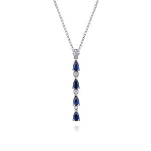 Gabriel & Co. NK7877W45SA 14 karat white gold Color necklace, front view of the vertical drop of blue pear stones between small round diamonds