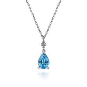 Gabriel & Co. NK7902SVJBT sterling silver Bujukan necklace, front view of a blue pear shaped stone below a cluster of round beads and a plain bail