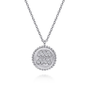 Gabriel & Co. NK7924AQ-SV5JJ sterling silver Bujukan necklace, front view of the disc with two zigzag stone rows and a beaded rim