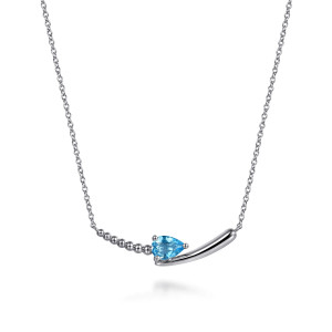 Gabriel & Co. NK7930SVJBT sterling silver Bujukan necklace, front view of the curved bar, its bead line, blue pear stone and smooth tapering blade