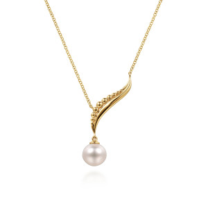 Gabriel & Co. NK8269Y4JPL 14 karat yellow gold Bujukan necklace, front view of the tilted bar with its graduated beads above the single pearl