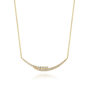 Gabriel & Co. NK8293Y45JJ 14 karat yellow gold Kaslique necklace, front view of the crescent bar with graduated prong set stones above a pave arm