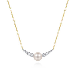 Gabriel & Co. NK8305M45PL 14 karat white and yellow gold Lusso necklace, front view of the pearl at the center of the curved bar with stones stepping down each side