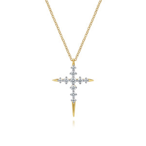Gabriel & Co. NK8317Y45JJ 14 karat yellow gold Kaslique necklace, front view of the cross with its line of prong set stones and spiked tips