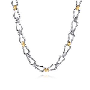 Gabriel & Co. NK8340MZJJJ sterling silver and 14 karat yellow gold Bujukan necklace, front view of waved horseshoe links joined by clusters of polished metal beads