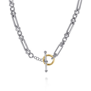 Gabriel & Co. NK8341MZJWS sterling silver and 14 karat yellow gold Bujukan necklace, clasp view showing the front toggle, its warmer ring and the stone band on the bar