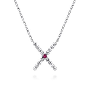 Gabriel & Co. NK8459SVJRB sterling silver Bujukan necklace, front view of the crossed bead rows and the red stone in its smooth bezel