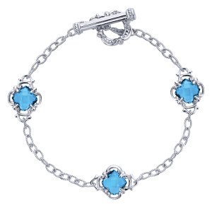 Gabriel & Co. TB2648SVJBT sterling silver Bujukan bracelet, front view of a loop with three blue stations and a toggle bar and ring at the top