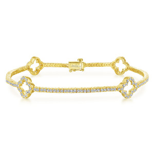 Gabriel & Co. TB3900Y45JJ 14 karat yellow gold Lusso bracelet, front view of open clover frames along the tennis line, with a box clasp at the top