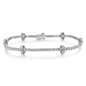 Gabriel & Co. TB4007W45JJ 14 karat white gold Lusso bracelet, front view of the tennis line with clover stations and a box clasp near the top