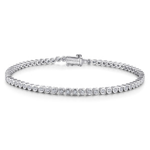 Gabriel & Co. TB4162W45JJ 14 karat white gold Lusso bracelet, front view of a bezel set tennis line closing on a box clasp with a maker's mark