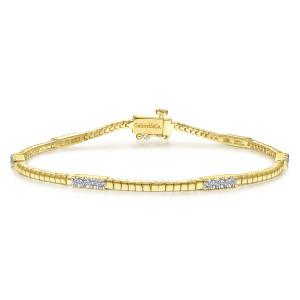 Gabriel & Co. TB4220Y45JJ 14 karat yellow gold Contemporary bracelet, front view of a block band with diamond stations and a box clasp showing a maker's mark