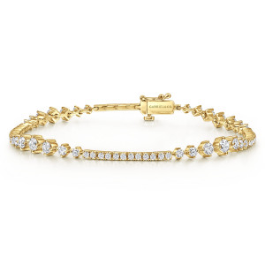 Gabriel & Co. TB4427Y45JJ 14 karat yellow gold Lusso bracelet, front view of the central pave bar, graduated side stones and a box clasp at the top